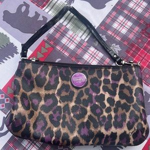 Purple and tan coach clutch
